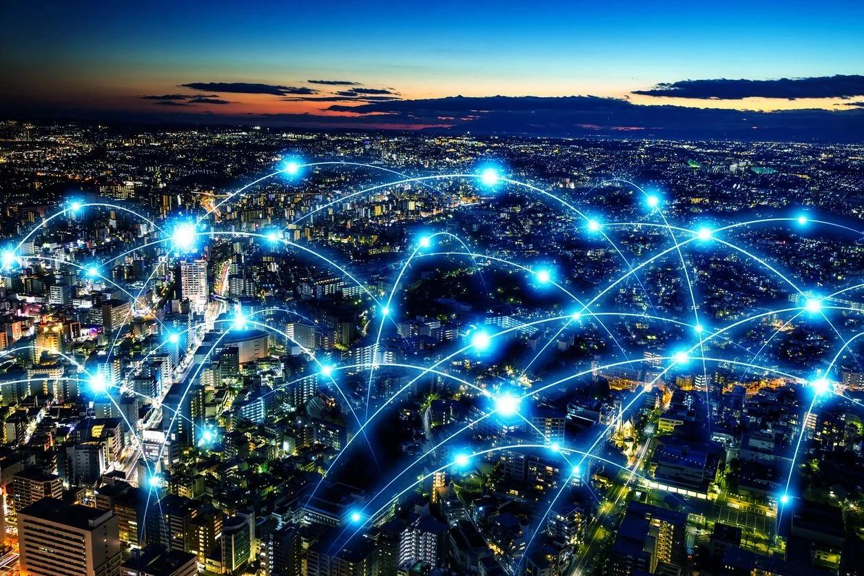 Connected city at dusk, illustrating technology networks